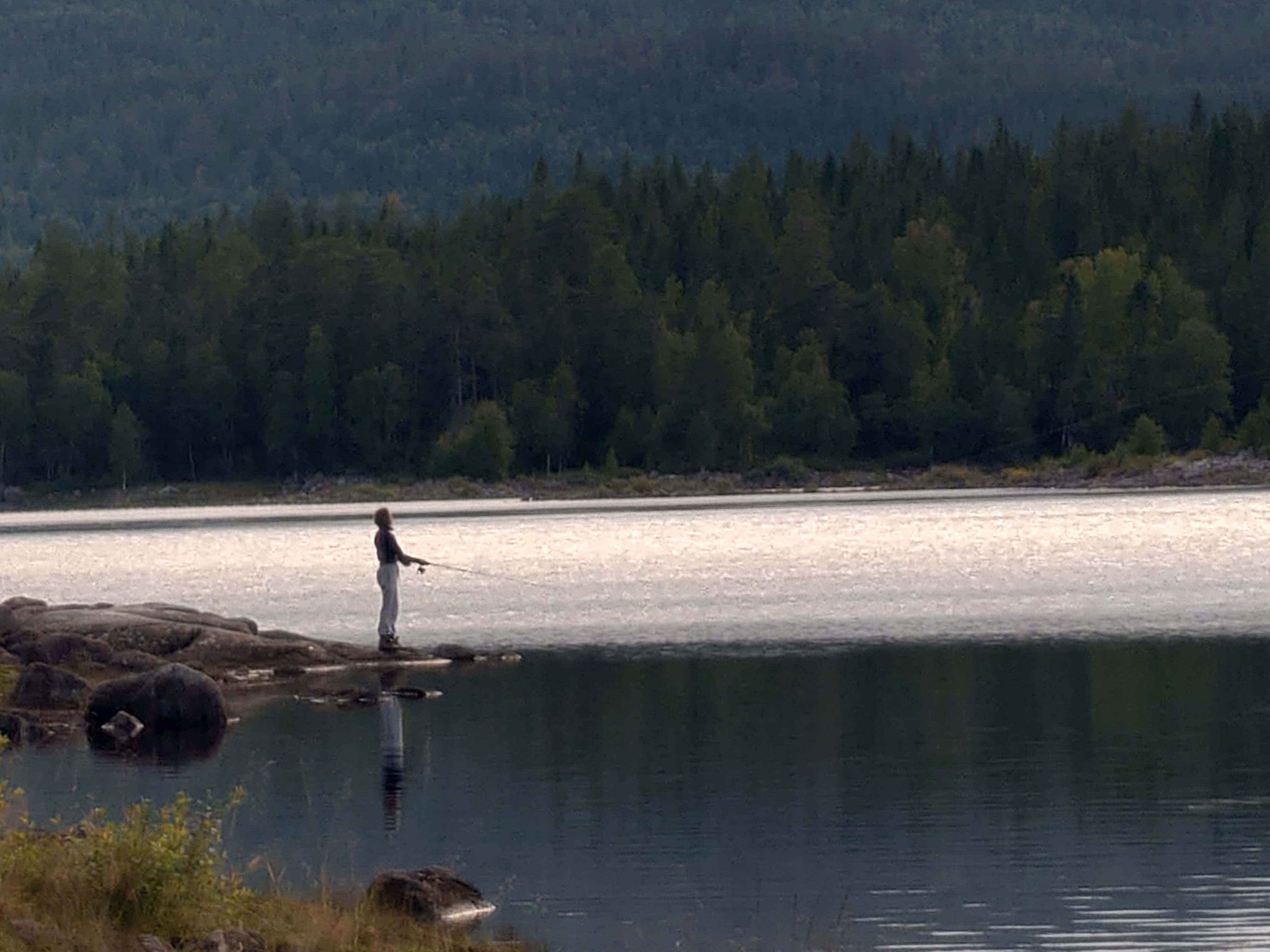 Girlfriend fishing in the distance